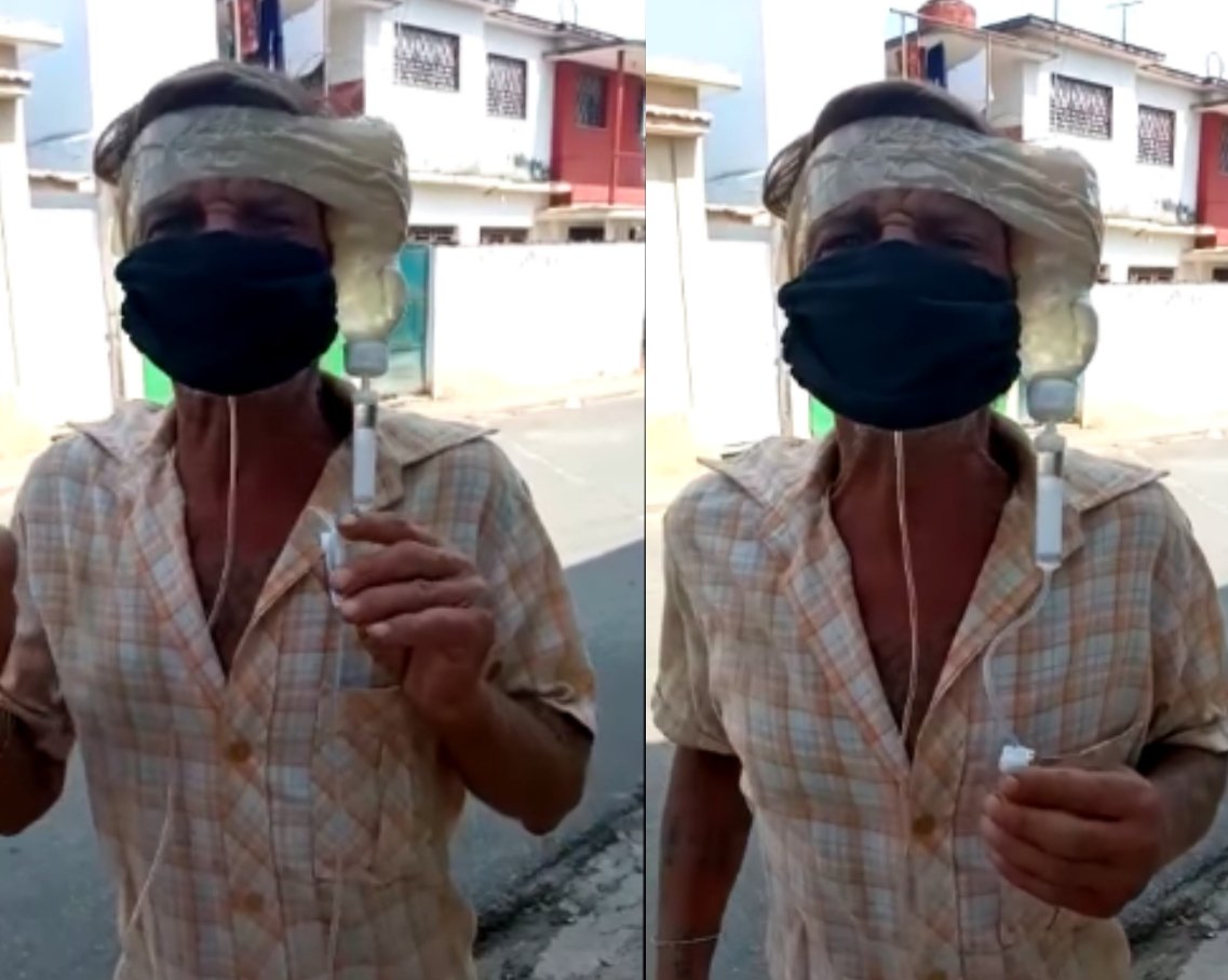 Anciano cubano inventa ‘dispositivo’ para tomar agua sin quitarse el nasobuco en la calle (FACEBOOK ALAIN PAPARAZZI TV)