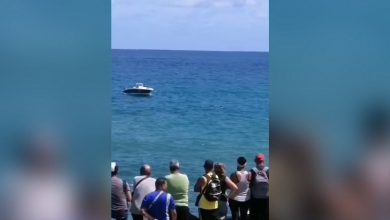 El cuerpo fue rescatado por un par de buzos. (Captura de pantalla © Anibal Ferrand-Facebook)